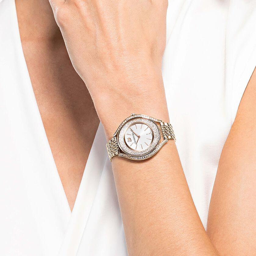 swarovski crystalline aura watch  swiss made  metal bracelet  gold tone  champagne gold tone finish