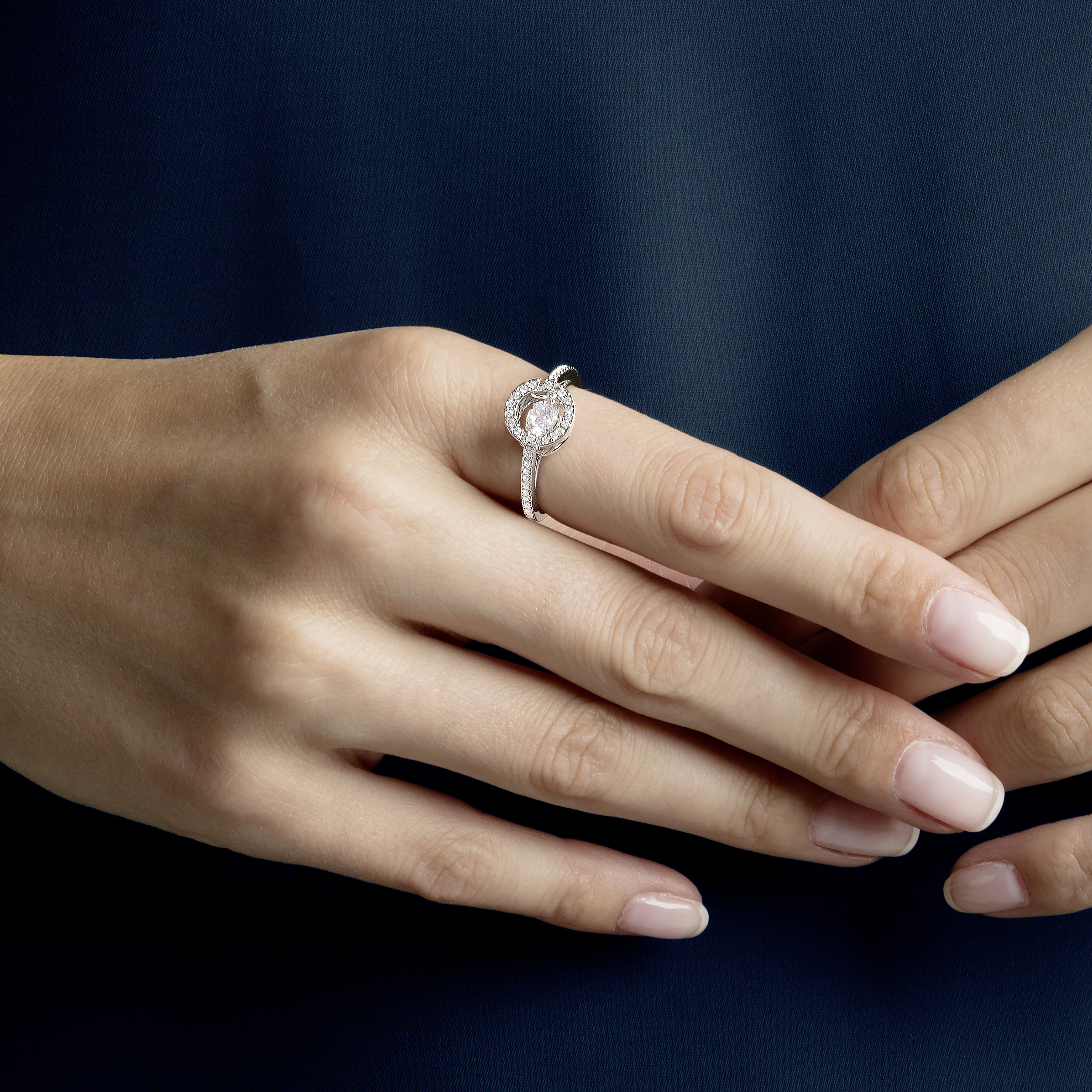 Dancing diamond hotsell ring swarovski