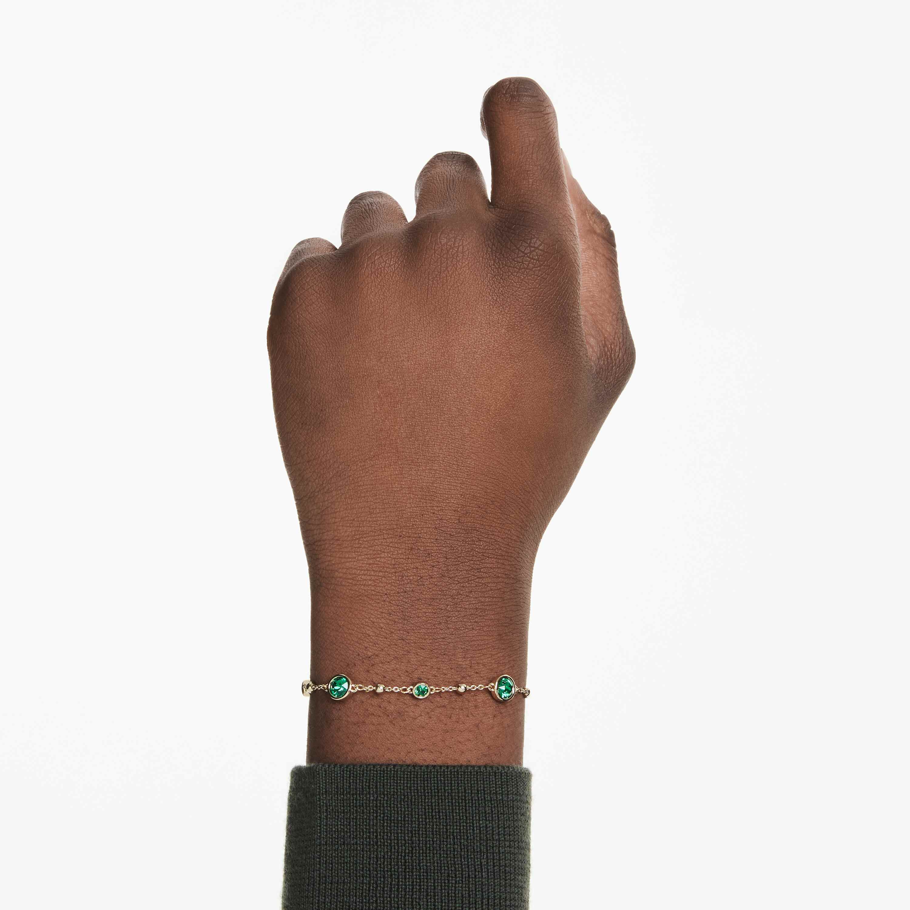 swarovski imber bracelet  round cut  green  gold tone plated