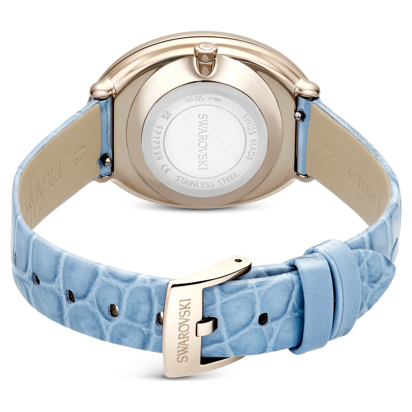 swarovski imber oval watch  swiss made  leather strap  blue  champagne gold tone finish