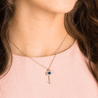 swarovski symbolica pendant  evil eye and key  blue  rose gold tone plated