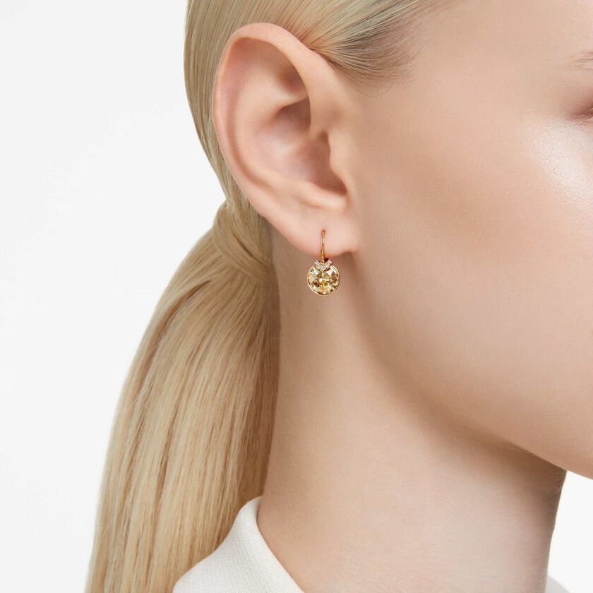 swarovski bella v drop earrings  round cut  gold tone  gold tone plated